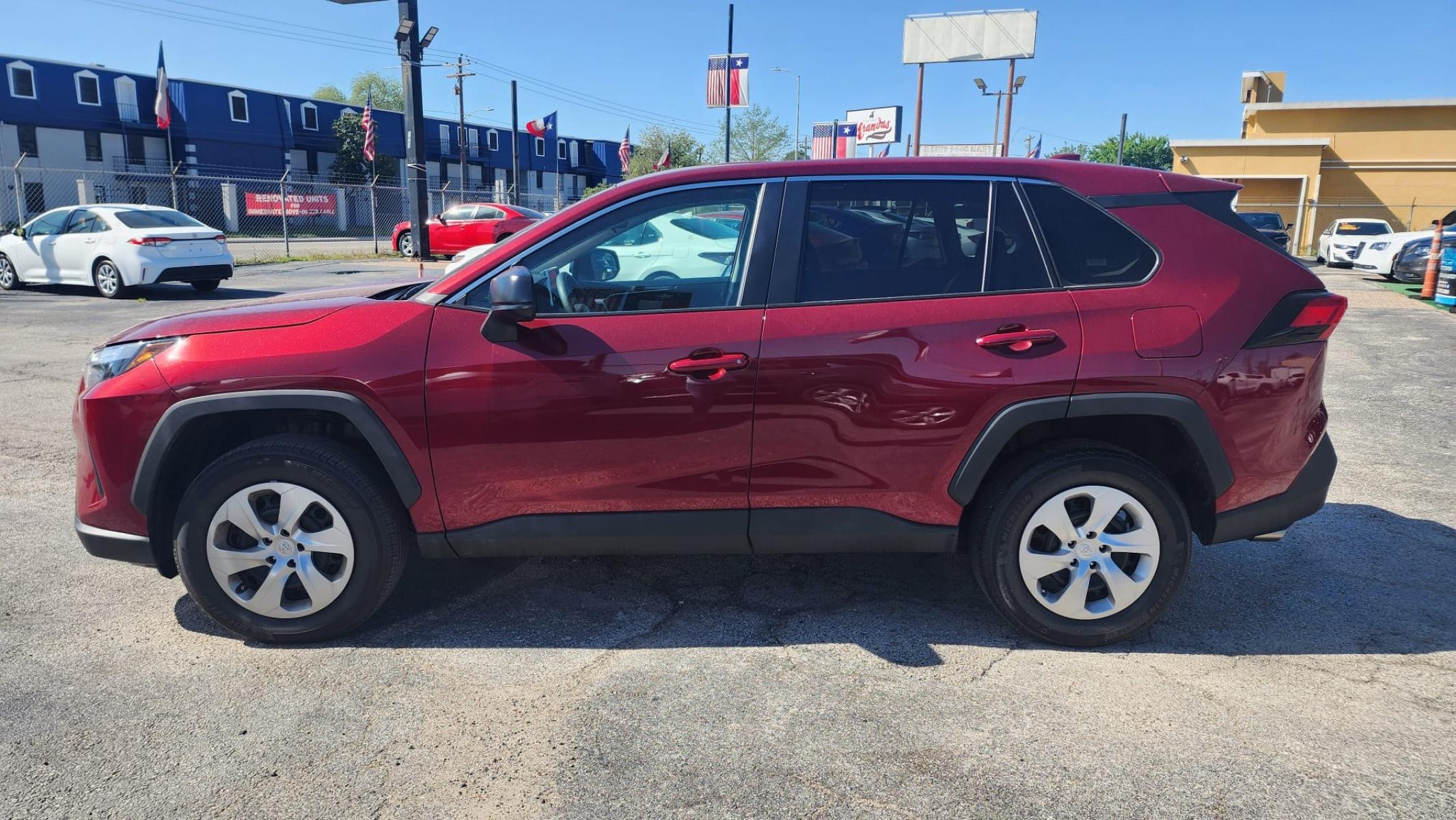 2023 Red Toyota RAV4 LE (2T3H1RFV9PW) with an 2.5L L4 DOHC 16V engine, 8A transmission, located at 1842 Wirt Road, Houston, TX, 77055, (713) 973-3903, 29.805330, -95.484787 - Photo #1